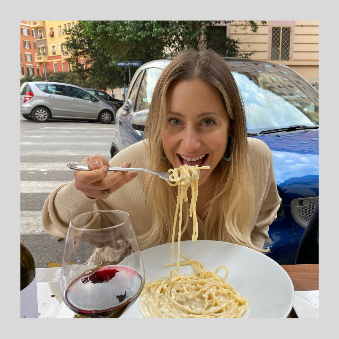 Marlo enjoying authentic Italian pasta in Rome